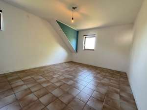 Maison à 2 appartements avec 2 garages 