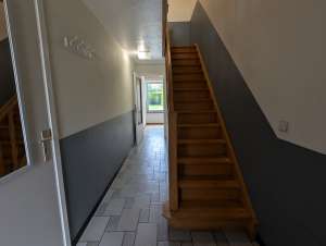 Maison unifamiliale avec 2 garages et 14 panneaux photovoltaïques