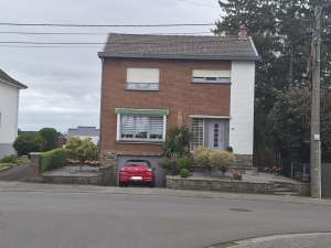 Maison 4 façades avec jardin et garage